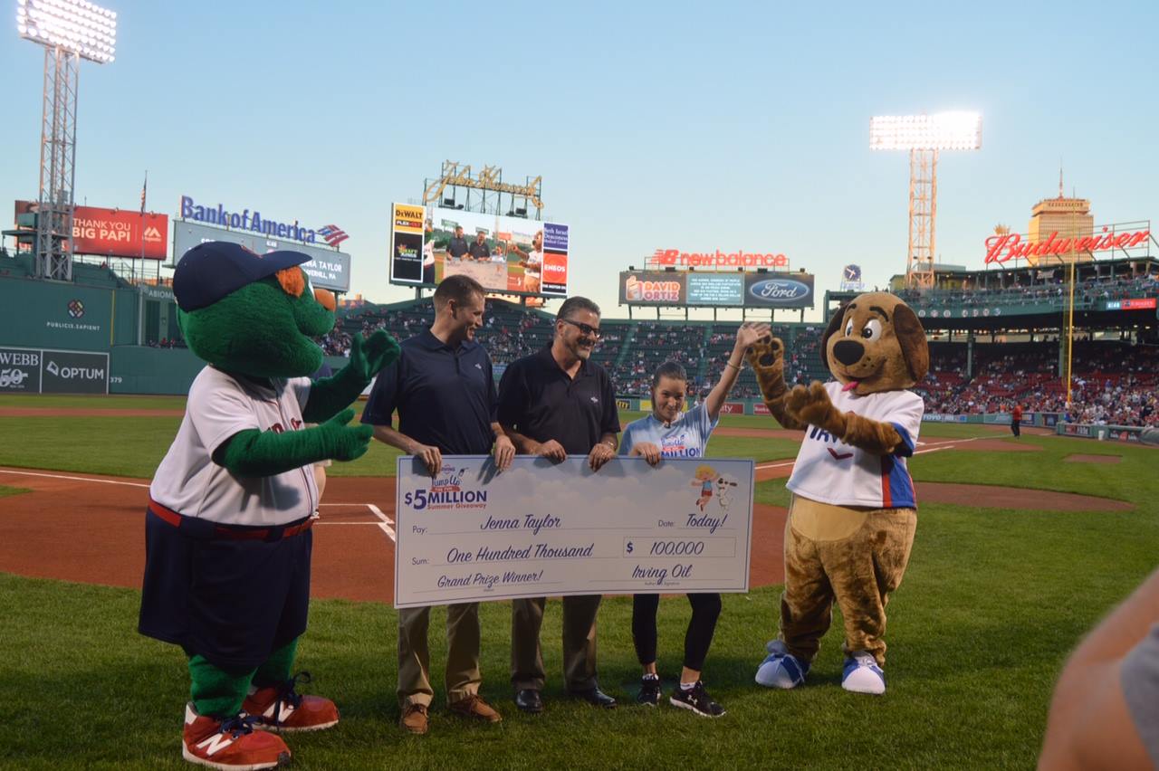 Receiving prize at the Red Sox game