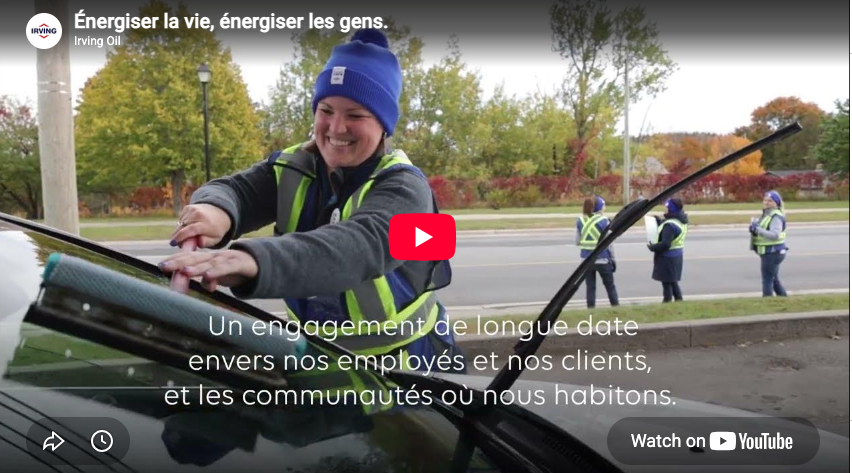 Good Energy Youtube videos thumbnail where an Irving Oil Employee is cleaning a customer's car windshield
